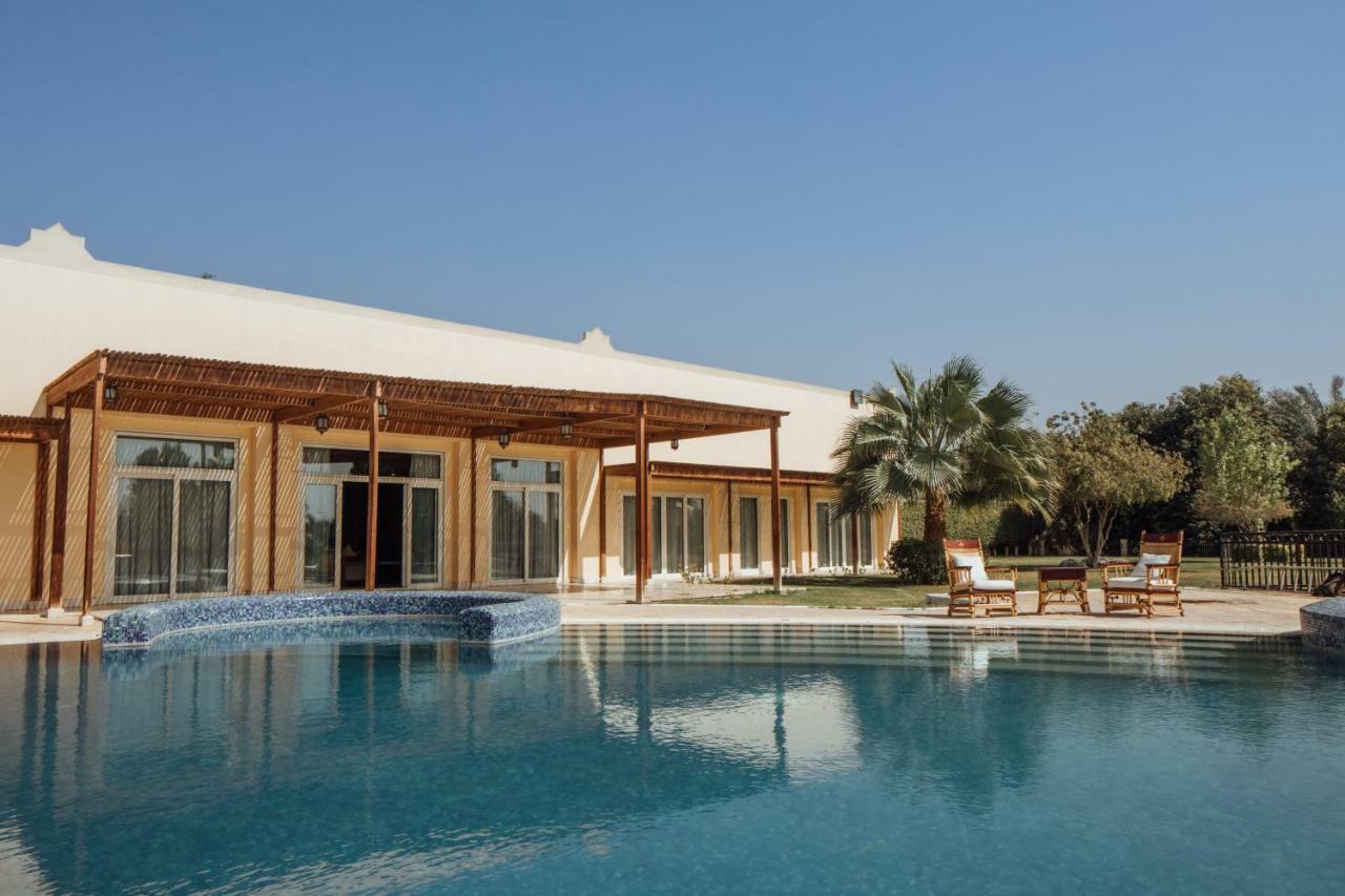 Jolie Ville Hotel & Spa Kings Island Luxor Buitenkant foto The resort's swimming pool